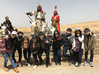 CUHK students pose for a group photo with Genghis Khan and his wife (Photo Credit: Miss Maggie Yip; Programme Host: Peking University)